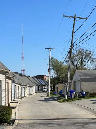 Blue skies and quiet city backstreets.